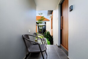 Quarto casal, vista para o jardim | Terraço/pátio