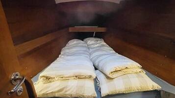 3 slaapkamers, een strijkplank/strijkijzer, beddengoed