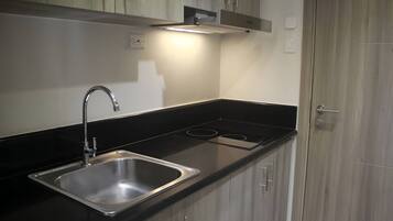 Microwave, stovetop, dishwasher, cookware/dishes/utensils