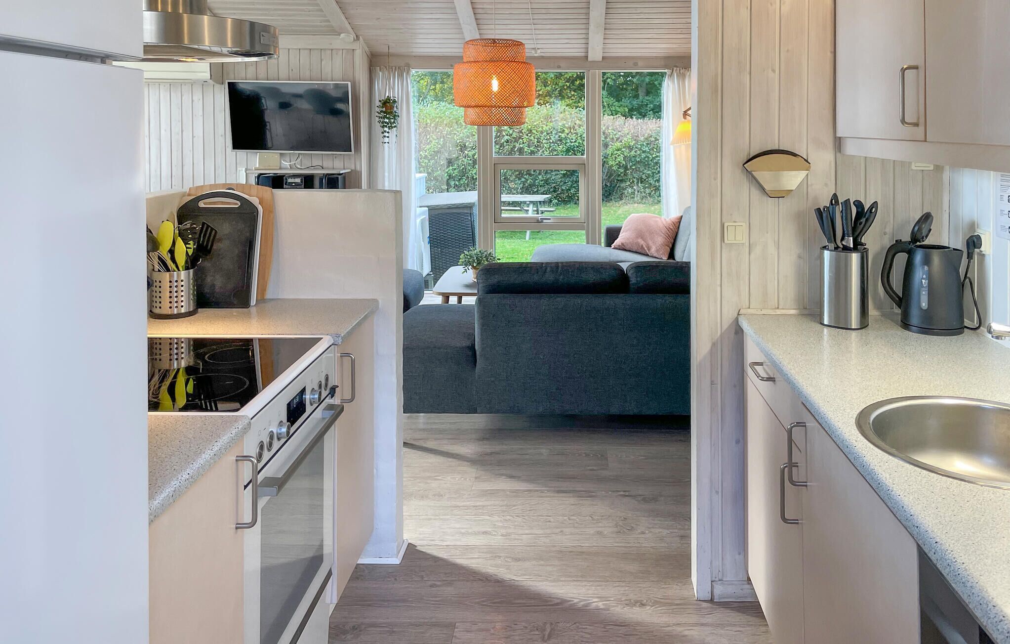 Fridge, stovetop, dishwasher, coffee/tea maker