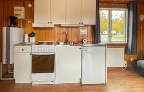 Fridge, stovetop, coffee/tea maker, cookware/dishes/utensils