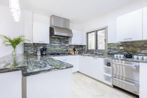 Villa, Golf View | Private kitchen | Highchair - Villa Desiree - Family Villa in Cocotal (Punta Cana)