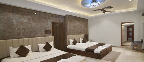 Premium bedding, desk, laptop workspace, free WiFi