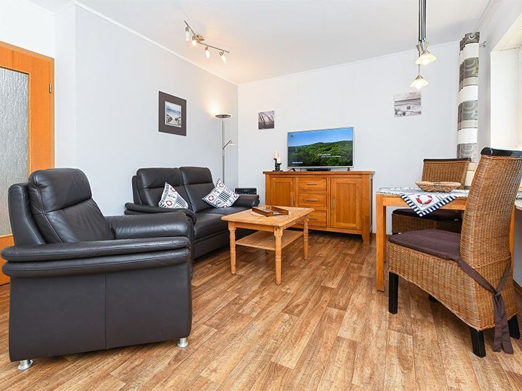 Wohnzimmer mit integriertem Küchenbereich