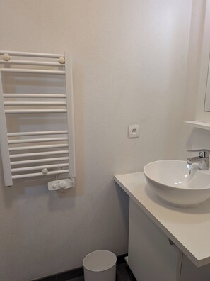 Hair dryer, towels, soap, shampoo