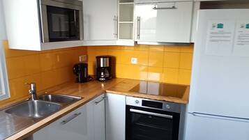 Gîte Duplex 3 pièces 4 personnes | Cocina privada | Trona infantil