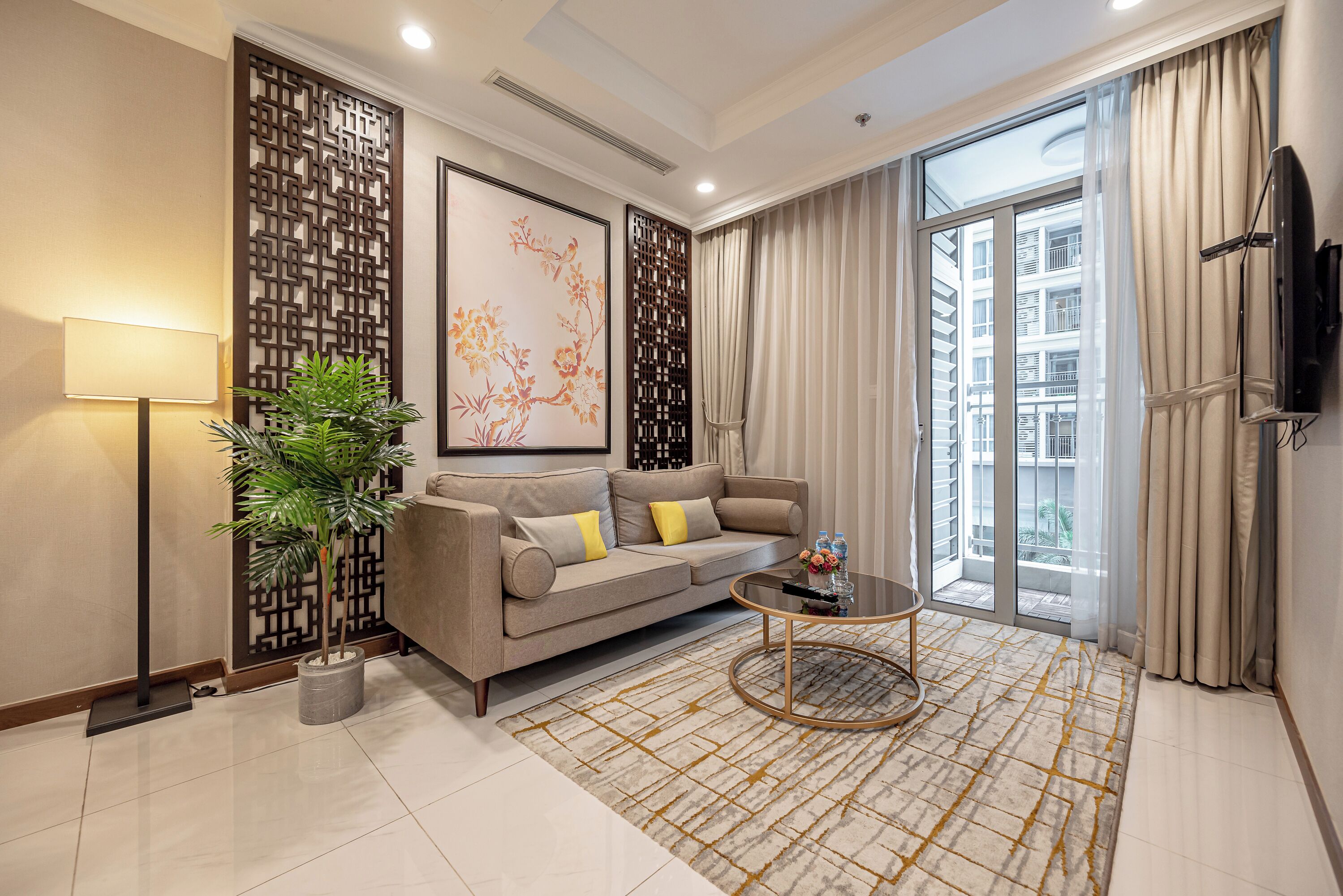 Deluxe Apartment, 1 Bedroom, Balcony, Courtyard View | Living area | Flat-screen TV, books