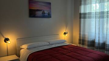 3 habitaciones, tabla de planchar con plancha y acceso a internet