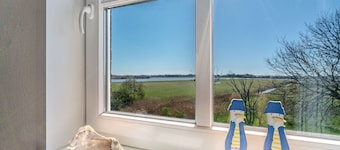Apartamento 'Fewo Weitblick' con vistas al lago, jardín compartido y Wi-Fi