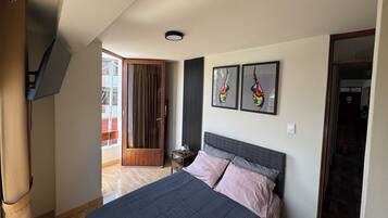 2 habitaciones, tabla de planchar con plancha y wifi gratis