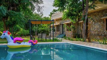 Luxury Suite, Pool View | Outdoor pool