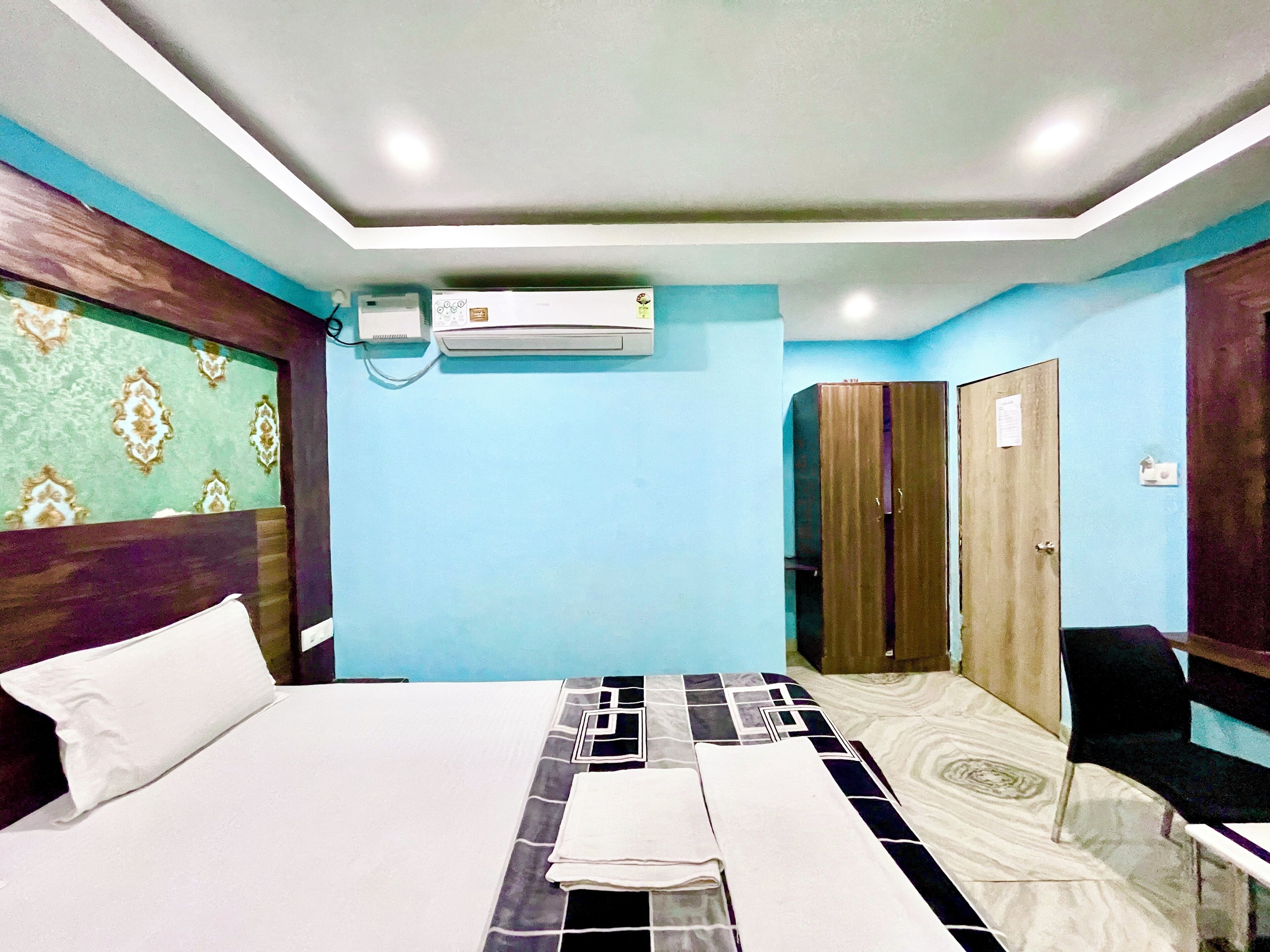 Premium bedding, desk, laptop workspace, soundproofing