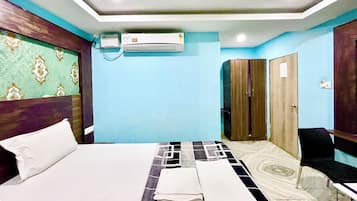 Premium bedding, desk, laptop workspace, soundproofing