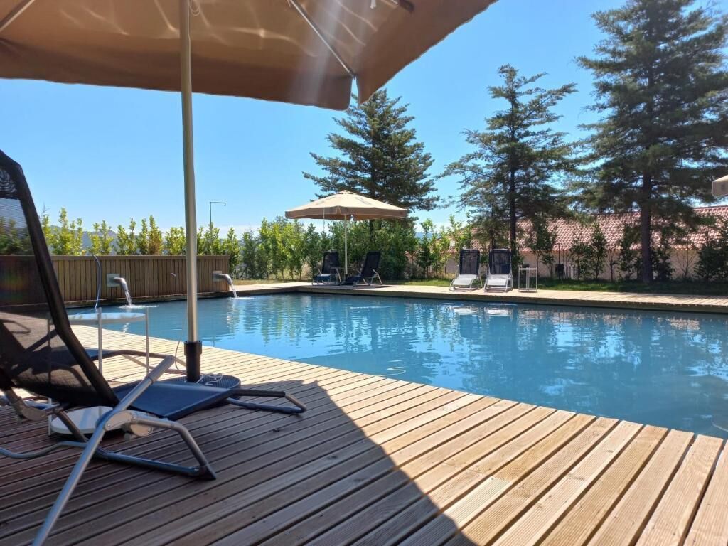 Seasonal outdoor pool, pool umbrellas, sun loungers