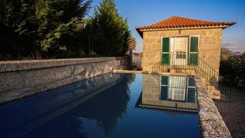 House, Balcony, Garden View | Pool | Seasonal outdoor pool, pool umbrellas, sun loungers