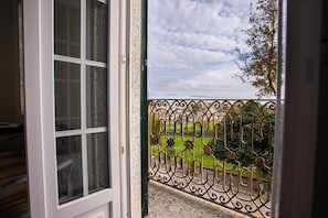 Deluxe suite, balkon, uitzicht op tuin | Interieur
