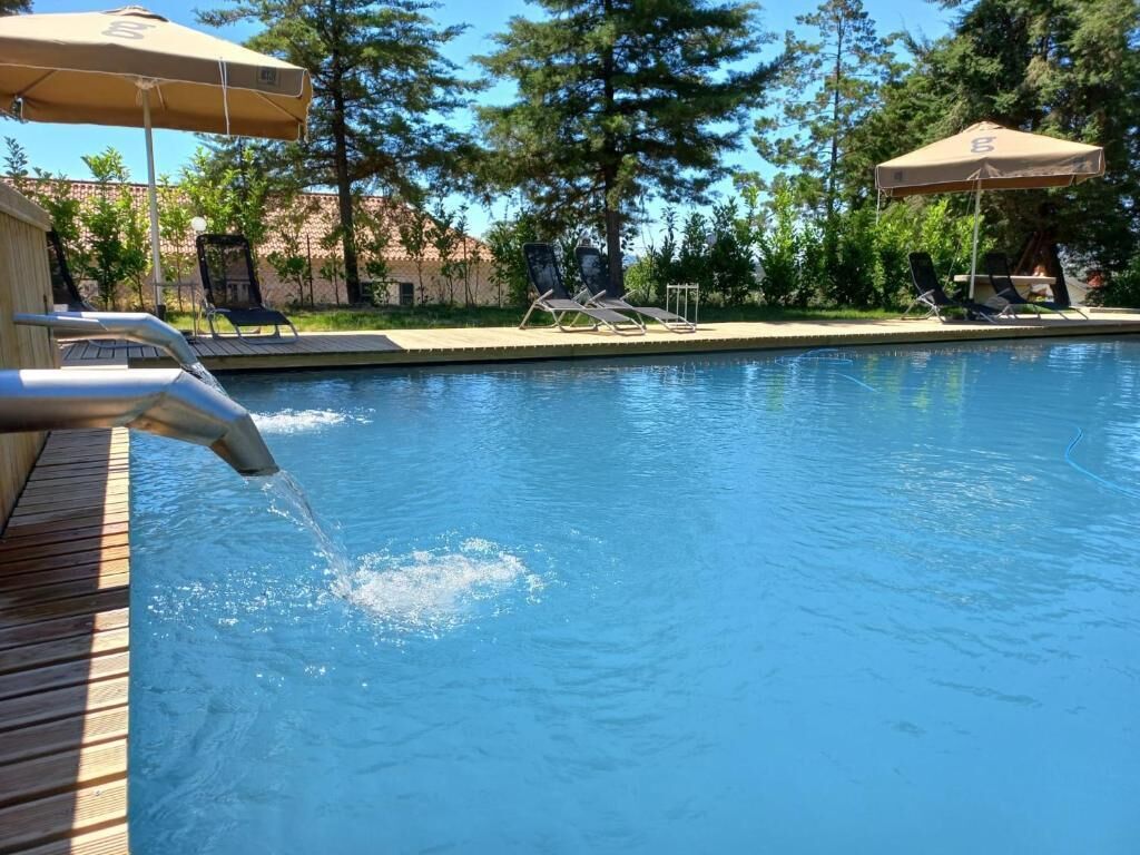 Seasonal outdoor pool, pool umbrellas, sun loungers