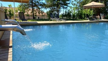 Seasonal outdoor pool, pool umbrellas, sun loungers