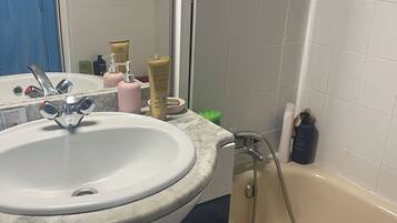 Hair dryer, towels, soap, toilet paper