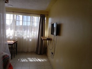 Habitación individual estándar | Wifi gratis y ropa de cama