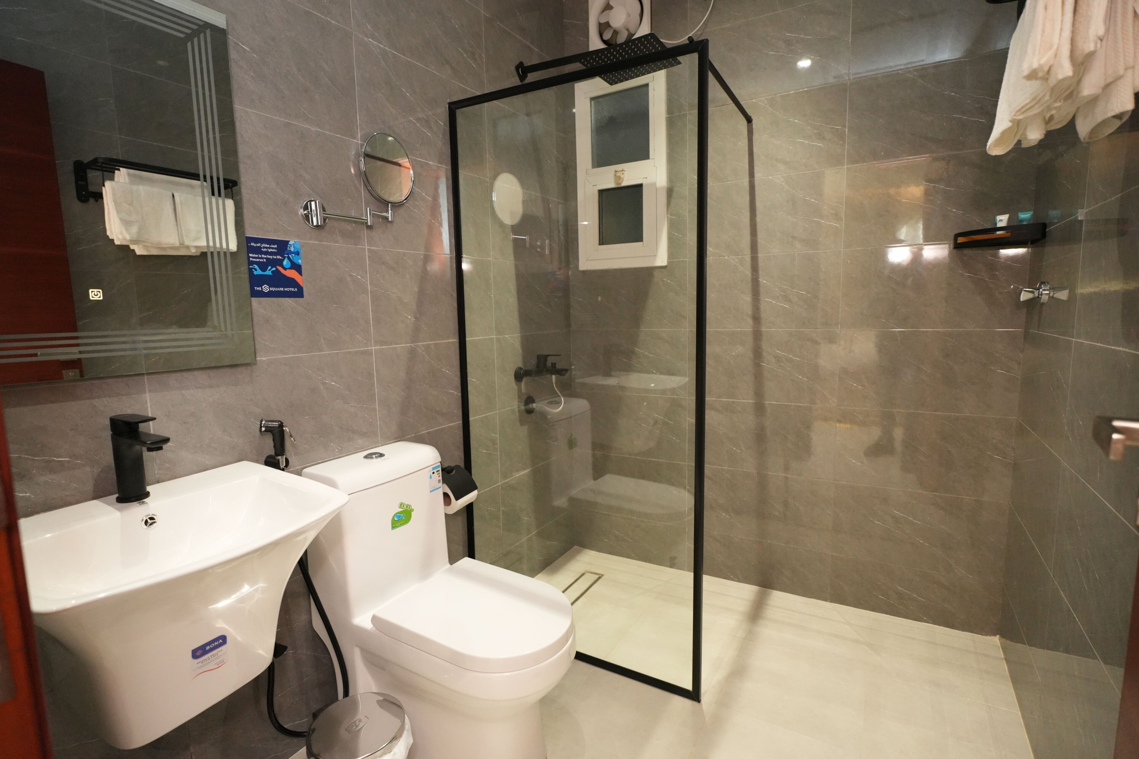 Junior Triple Room, City View | Bathroom | Shower, hair dryer, slippers, towels