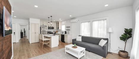Living room flowing into the kitchen
