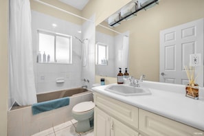Hair dryer, towels, soap, toilet paper