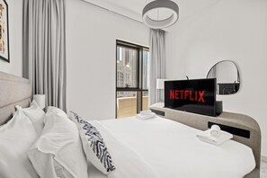 2 chambres, coffres-forts dans les chambres, fer et planche à repasser