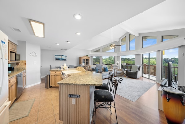 Signature Duplex, 4 Bedrooms, Kitchen, Bay View | Living room | 40-inch Smart TV with digital channels