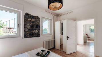 Premium bedding, down duvets, iron/ironing board, cots/infant beds