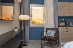 Appartamento, vista giardino | Minibar, ferro/asse da stiro, Wi-Fi gratuito