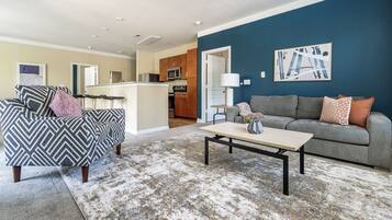 Apartment (2 Bedrooms) | Living area | 50-inch TV with digital channels, ping pong