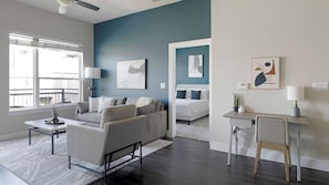 Apartment (2 Bedrooms) | Living area | 50-inch TV with digital channels
