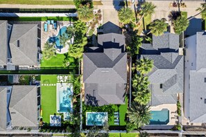 Aerial view showing home layout and private backyard pool - 4BR Pool Game Room | Good Morning Rentals (Jacksonville Beach)