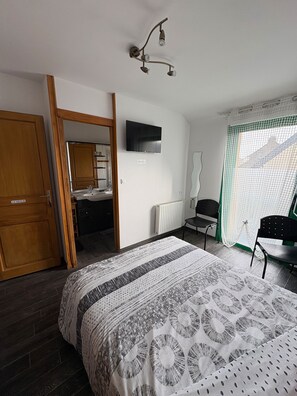 1 غرفة نوم وواي فاي وملاءات أسرّة