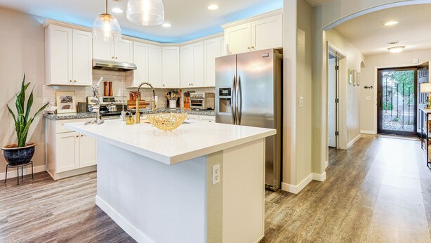 A modern kitchen with white cabinetry, stainless steel appliances, and a large island. - Pool Access! Suburban Home 11 Mi to Dtwn Gilbert (Gilbert)