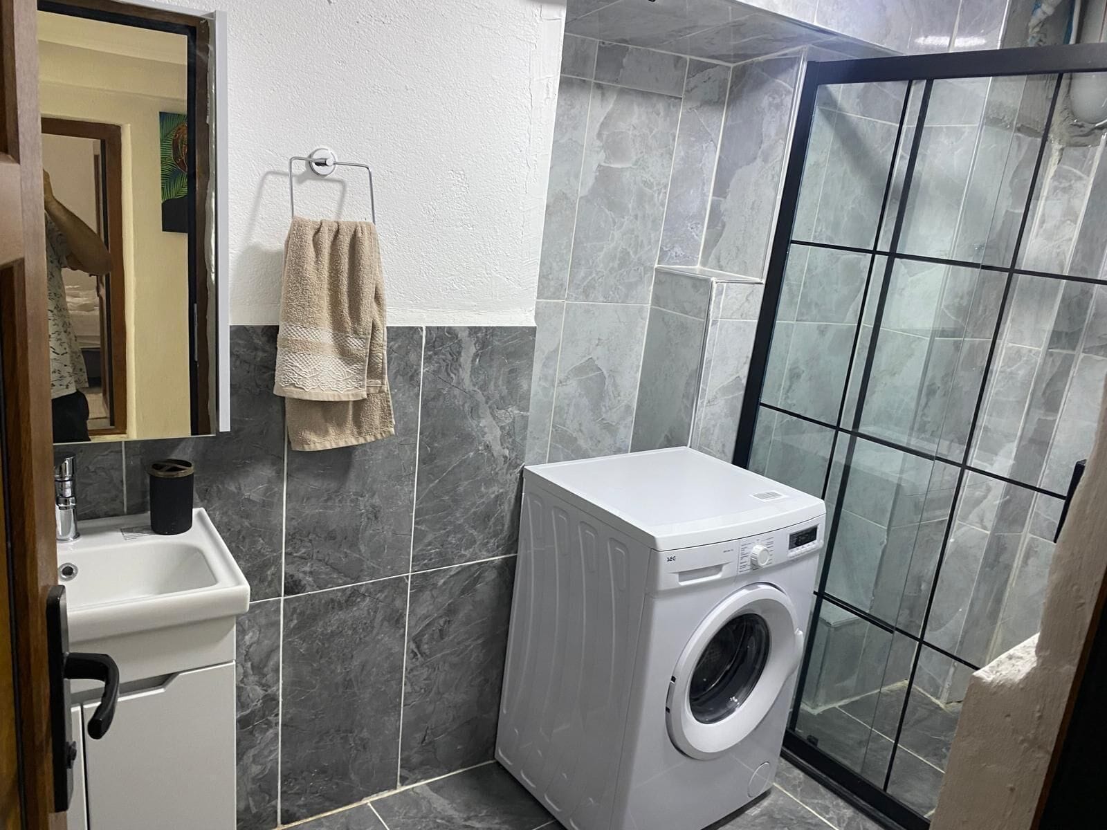 Shower, slippers, towels, soap