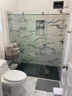 Hair dryer, towels, soap, toilet paper