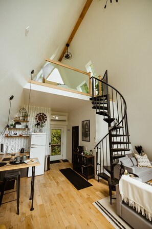 TV, fireplace - “The Pinnacle”, A Luxury A-frame Treehouse (Logan)