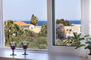 In-room safe, desk, laptop workspace, blackout drapes - Sueno Studios and Apartments (Chania)