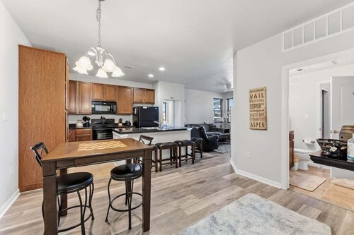 Spacious, ground floor 2 bedroom with private patio, 2 dining areas and upscale,