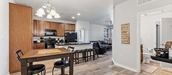 Spacious, ground floor 2 bedroom with private patio, 2 dining areas and upscale,