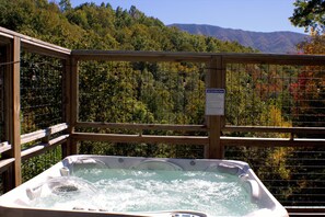 Cabin, 4 Bedrooms | Outdoor spa tub