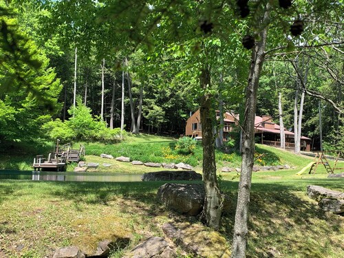 This beautiful Lodge in the woods is perfect for year round enjoyment!