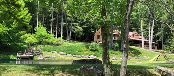 This beautiful Lodge in the woods is perfect for year round enjoyment!