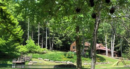 This beautiful Lodge in the woods is perfect for year round enjoyment!