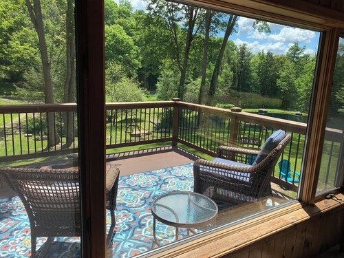 This beautiful Lodge in the woods is perfect for year round enjoyment!