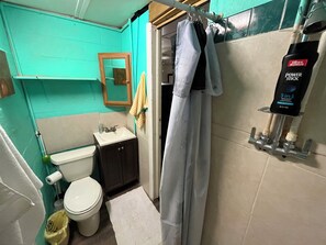 Shower, towels, soap, toilet paper