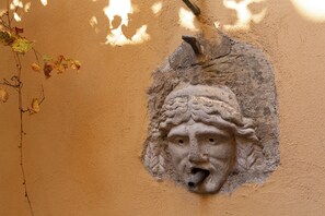 A stone relief on a wall.