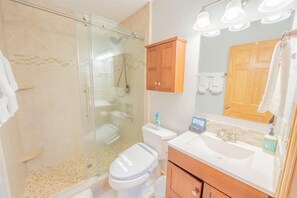 Shower, hair dryer, towels, soap